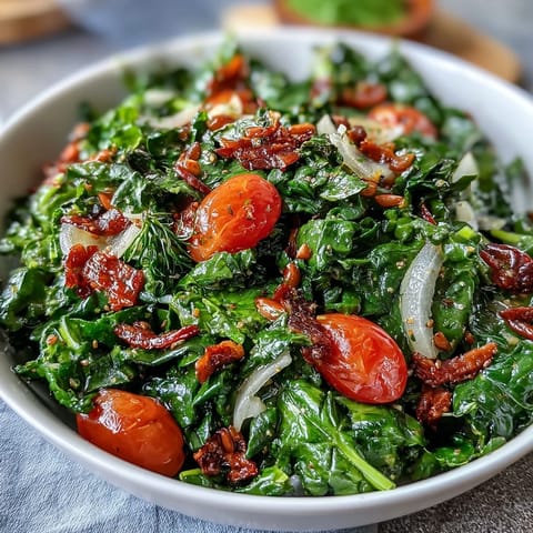 Crisp dandelion greens tossed with cherry tomatoes, toasted pine nuts, and Parmesan in zesty lemon vinaigrette.  