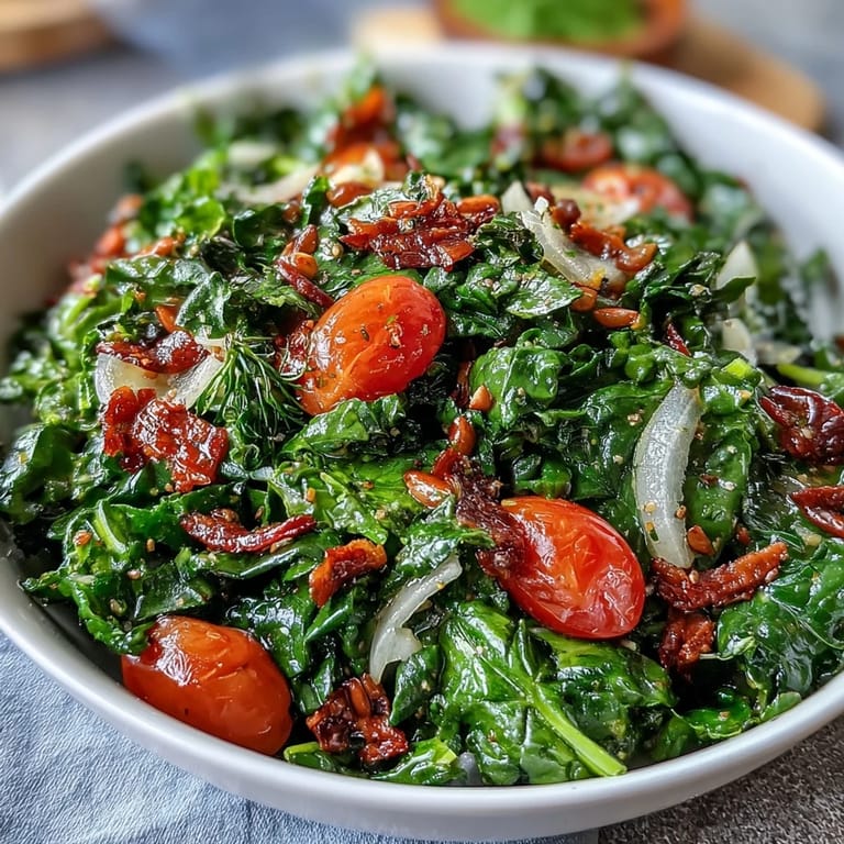Crisp dandelion greens tossed with cherry tomatoes, toasted pine nuts, and Parmesan in zesty lemon vinaigrette.  